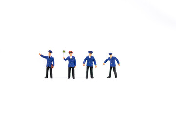 Miniature people : Police and white background, copy space for the extra text.