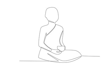 A monk sits in meditation. Monk one-line drawing