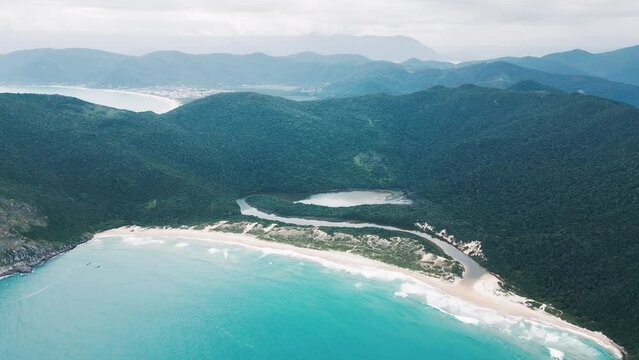 Aerial view of the sandy beach in Brazil. Lagoinha do leste beach and lagoon on the south of Brazil