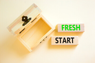 Fresh start and motivational symbol. Concept words Fresh start on beautiful wooden block. Beautiful white background. Empty wooden chest. Business motivational and Fresh start concept. Copy space.