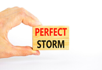 Perfect storm symbol. Concept words Perfect storm on beautiful wooden block. Beautiful white table white background. Businessman hand. Business and Perfect storm concept. Copy space.