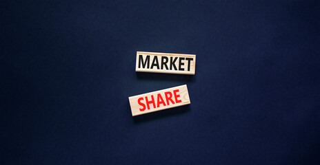 Market share symbol. Concept words Market share on beautiful wooden block. Beautiful black table black background. Business and Market share concept. Copy space.