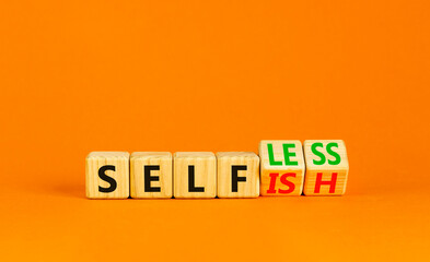 Selfish or selfless symbol. Psychologist turns cubes and changes the word selfish to selfless....