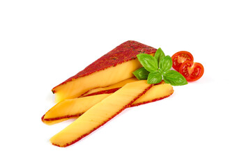 Semi-hard cheese with sun-dried tomatoes and herbs, isolated on white background.