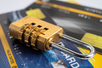 Credit card with password key lock, finance security concept.