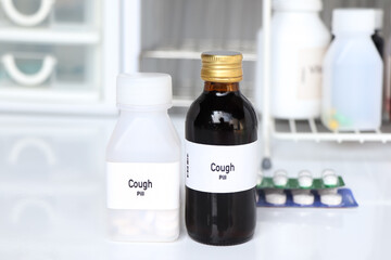 cough pill in white bottle, pill stock