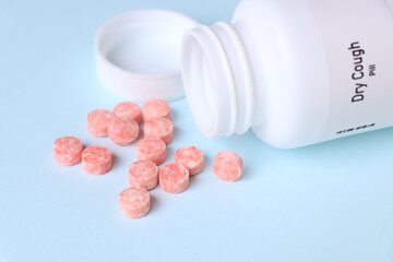 Dry Cough pill in white bottle, pill stock