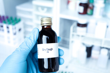 Dry Cough pill in white bottle, pill stock