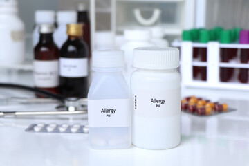 Allergy pill in white bottle, pill stock