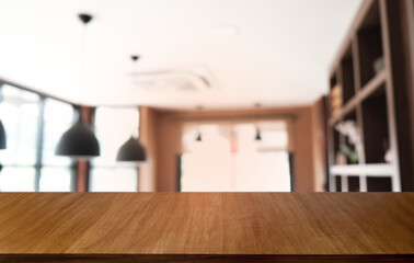 Empty dark wooden table in front of abstract blurred bokeh background of restaurant . can be used for display or montage your products.Mock up for space.