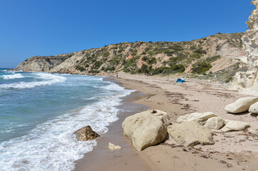 sand and rocks on Guvercinlik Koyu (Kleopatra Beach) near Ovacik (Cesme, Izmir province, Turkey)  - obrazy, fototapety, plakaty