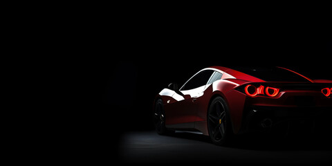 Obraz na płótnie Canvas Stylish red sport car on the black background banner with copy space