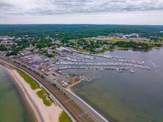 Fototapeta premium Niantic Beach and Port Marina aerial view in a cloudy day between Niantic River and Niantic Bay in village of Niantic, East Lyme, Connecticut CT, USA. 
