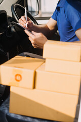 Business woman start up small business entrepreneur SME success .freelance woman working at home with Online Parcel delivery. SME and packaging deliveryconcept