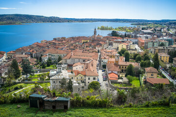 View from the hill on Lake Maggiore, sailboats and mountains