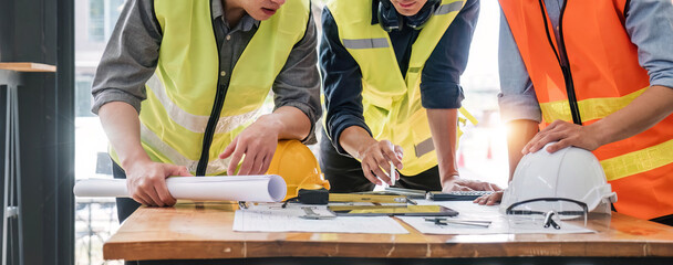 Engineer Teamwork Meeting, Drawing working on blueprint meeting for project working with partner on...