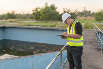 Environmental engineers work at wastewater treatment plants,Water supply engineering working at Water recycling plant for reuse