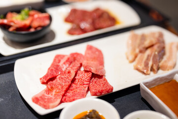 Slice of fresh beef meat in Japanese grill restaurant