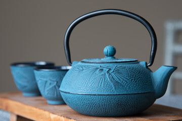 beautiful blue japanese teapot with two cups