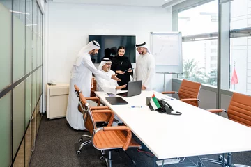Fotobehang Group of middle-eastern corporate business people meeting in the office © oneinchpunch