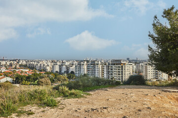 New urban area and construction of new houses, next to the city park