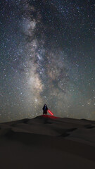 Dangerous Master of the Dunes at Night With Vertical Milky Way - 597247370