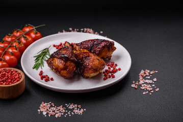 Delicious grilled chicken legs with spices and herbs in teriyaki sauce