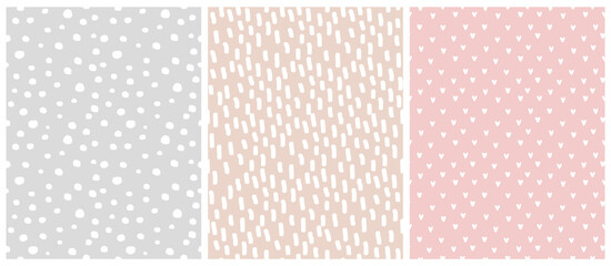 Abstract Hand Drawn Geometric Vector Patterns. White Spots,Lines and Hearts Isolated on a Pink, Gray and Beige Background. Irregular Geometric Repeatable Vector Print ideal for Fabric,Wrapping Paper.