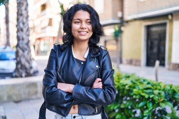 Young latin woman  at street