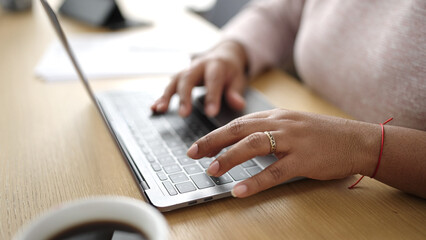 Young african american woman business worker using laptop working at office