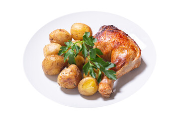 plate of baked chicken leg with potato isolated on transparent background