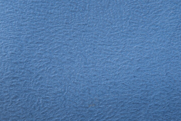 Fototapeta na wymiar texture creata con pelle finta di colore blu- azzurro, sfondo di colore blu, pattern colorato