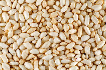 Crisped puffed rice cereal as background texture - close-up