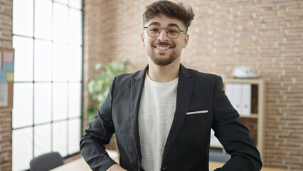 Young arab man business worker smiling confident standing at office