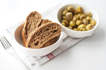 breads and Turkish Grilled olives on white background 