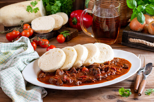 Classic Czech goulash with dumplings, delicious food, homemade Karlovarsky dumplings