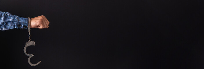 handcuffs arrested policeman hand