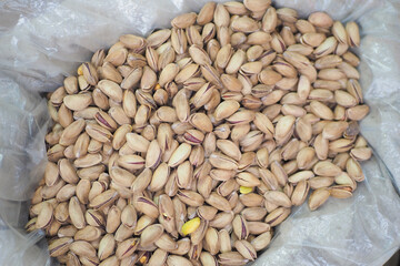 top view of pistachios nuts on in bowl 