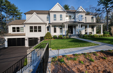 New suburban home in a transitional style - a mixture of traditional New England and modern elements