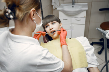 Young woman at the dentist's reception