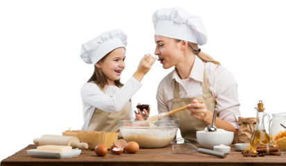 The beautiful young mother and her little daughter cooking