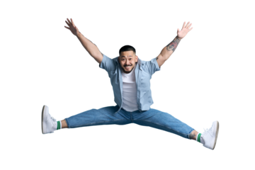 Overjoyed asian man with stylish  jumping in twine, having fun, celebration success isolated on transparent background. Clipping path. Freedom concept 