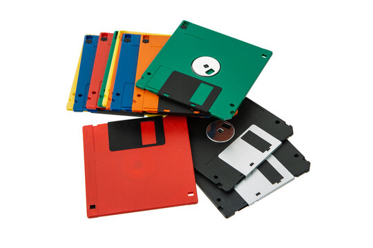 Multi-colored 3.5 floppy disks. Obsolete magnetic storage medium. Isolate on a white back.