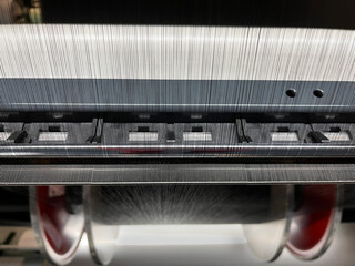 Close up view of the knitting machine