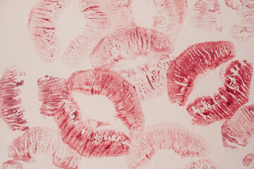 Red lipstick imprints on white paper, kiss, beautiful red lips - obrazy, fototapety, plakaty
