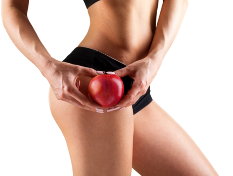 Young sport woman showing vegetable and healthy food