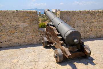 Ancient cannon on the Baluard de Sant Jaume ("Bastion of Saint James") on the fortifications of Eivissa, the capital city of Ibiza in the Balearic Islands, Spain