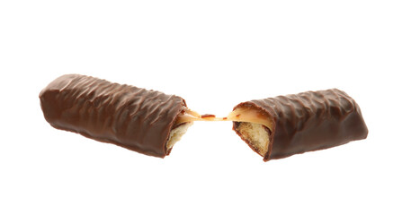 Pieces of chocolate bar with caramel on white background