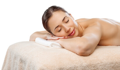 Relaxed young female getting a massage in a spa salon