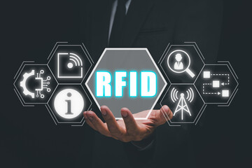 RFID, Radio frequency identification concept, Businessman hand holding Radio frequency...